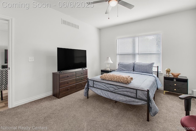 11801 Hines Place Dr, Livonia, MI 48150 - carpeted bedroom featuring baseboards and a ceiling fan