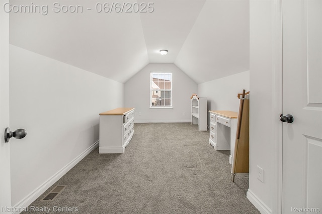 11801 Hines Place Dr, Livonia, MI 48150 - bonus room featuring vaulted ceiling, carpet, and baseboards