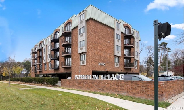 35300 Woodward Ave Unit 408, Birmingham, MI 48009 - view of apartment building / complex