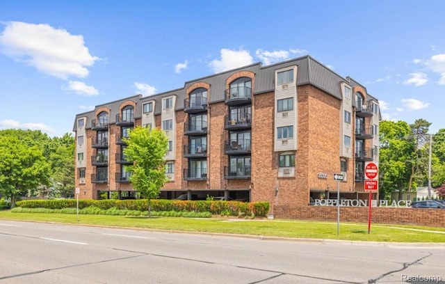 35300 Woodward Ave Unit 408, Birmingham, MI 48009 - view of apartment building / complex