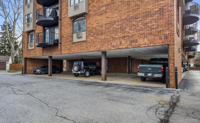 35300 Woodward Ave Unit 408, Birmingham, MI 48009 - view of property with covered parking