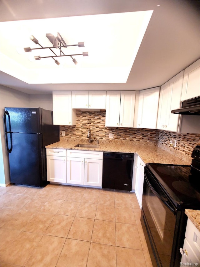 35300 Woodward Ave Unit 408, Birmingham, MI 48009 - kitchen featuring black appliances, a sink, under cabinet range hood, white cabinets, and decorative backsplash