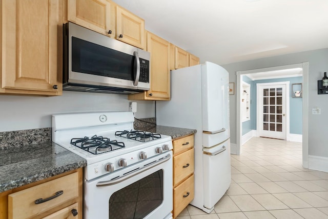 46860 Shelby Rd, Michigan, MI 48317 - kitchen with white appliances, light brown cabinetry, light tile patterned floors, and baseboards