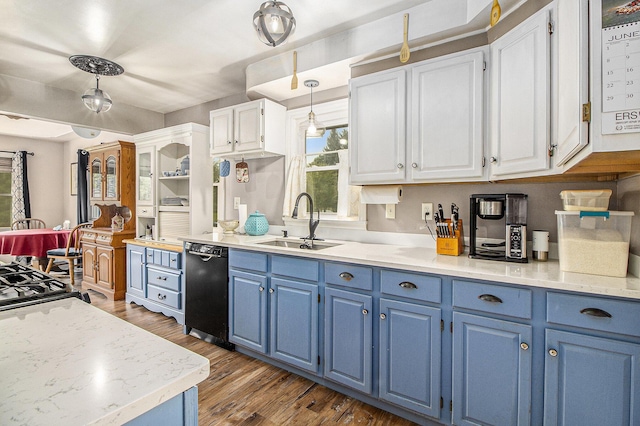 130 Woodway Ave, Battle Creek, MI 49014 - kitchen featuring blue cabinets, black dishwasher, a sink, and white cabinets