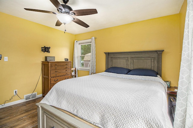 130 Woodway Ave, Battle Creek, MI 49014 - bedroom featuring dark wood-type flooring, baseboards, and ceiling fan