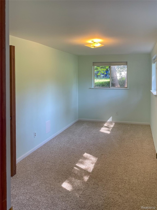 1749 Tannock Dr, Holly, MI 48442 - carpeted empty room with plenty of natural light