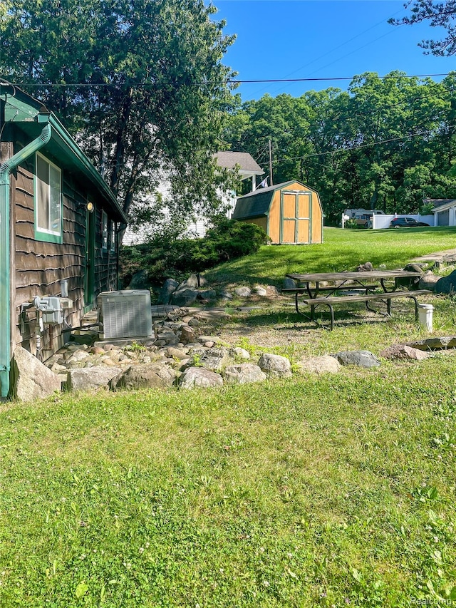 1749 Tannock Dr, Holly, MI 48442 - view of grassy yard with a shed