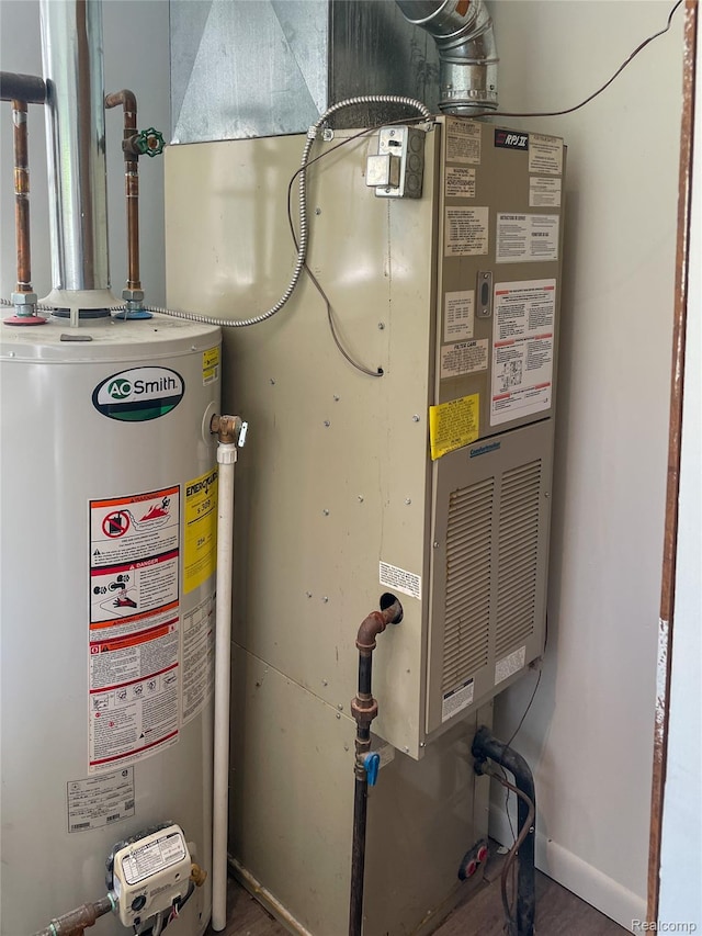 1749 Tannock Dr, Holly, MI 48442 - utilities with gas water heater and heating unit