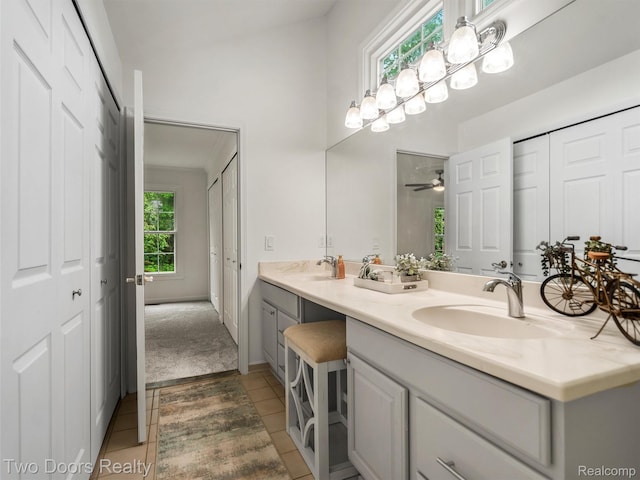 53020 Wolf Dr, Shelby Twp, MI 48316 - bathroom with double vanity, tile patterned flooring, and a high ceiling