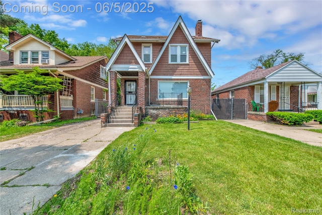 14953 Winthrop St, Detroit, MI 48227 - view of front facade featuring covered porch, a chimney, and brick siding