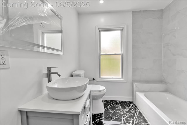 14953 Winthrop St, Detroit, MI 48227 - bathroom featuring vanity, toilet, marble finish floors, healthy amount of natural light, and recessed lighting