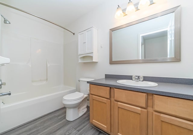 392 Woodfield Square Ln, Brighton, MI 48116 - full bathroom with vanity, bathtub / shower combination, toilet, and wood finished floors