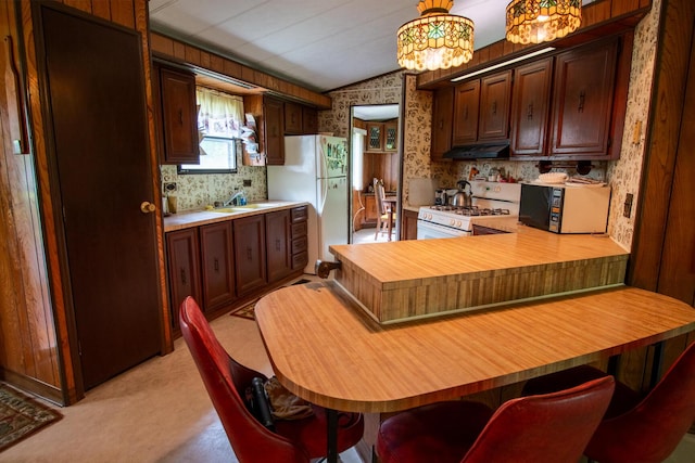 5125 S 148th Ave, Hesperia, MI 49421 - kitchen with white appliances, wallpapered walls, light countertops, exhaust hood, and light carpet