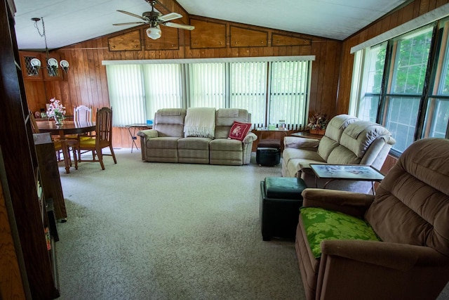 5125 S 148th Ave, Hesperia, MI 49421 - living area featuring lofted ceiling, carpet flooring, wood walls, and ceiling fan