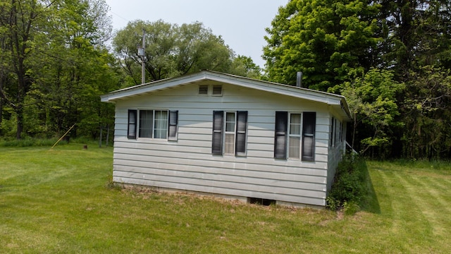 5125 S 148th Ave, Hesperia, MI 49421 - view of property exterior with a lawn