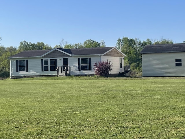 8295 Mccain Rd, Parma, MI 49269 - view of front of house with a front yard