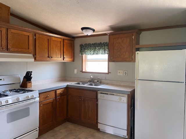 8295 Mccain Rd, Parma, MI 49269 - kitchen featuring white appliances, under cabinet range hood, brown cabinetry, light countertops, and a textured ceiling
