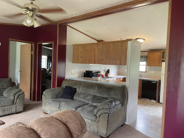 8295 Mccain Rd, Parma, MI 49269 - living room with ceiling fan, a textured ceiling, light floors, and lofted ceiling