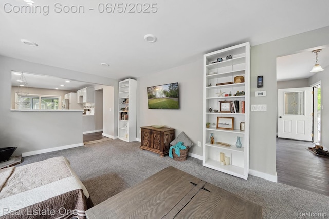 8921 Lake Rd, Grosse Ile, MI 48138 - carpeted living area featuring baseboards and healthy amount of natural light