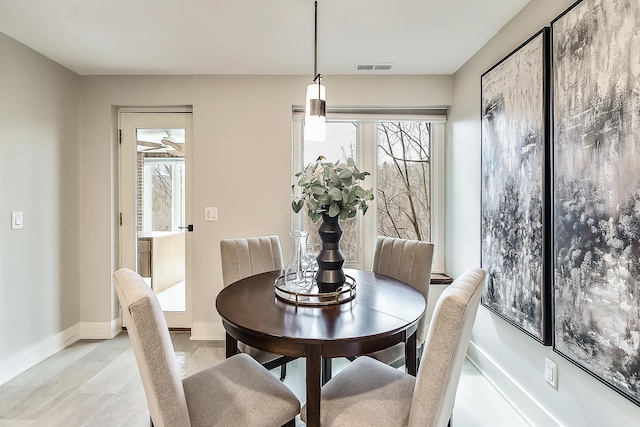 3000 Glazier Way Unit 130, Ann Arbor, MI 48105 - dining area with plenty of natural light, baseboards, and light wood-style flooring