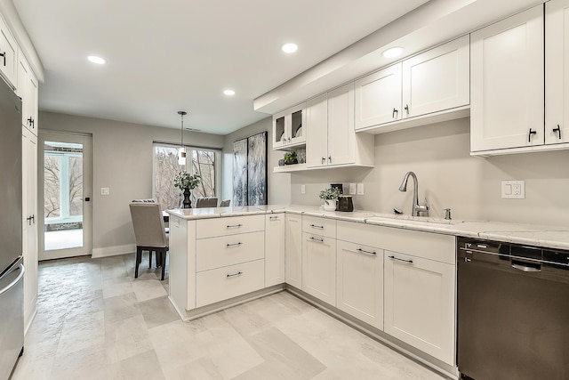 3000 Glazier Way Unit 130, Ann Arbor, MI 48105 - kitchen featuring dishwashing machine, a sink, a peninsula, recessed lighting, and white cabinetry