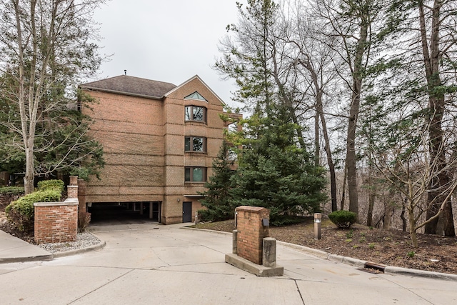 3000 Glazier Way Unit 130, Ann Arbor, MI 48105 - view of building exterior with concrete driveway