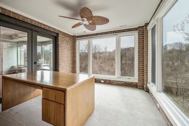 3000 Glazier Way Unit 130, Ann Arbor, MI 48105 - unfurnished sunroom with brick wall, carpet flooring, and ornamental molding