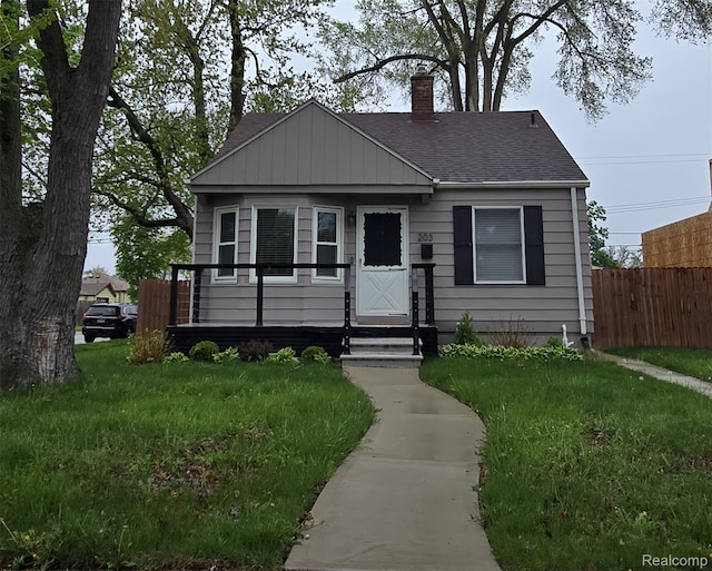 203 S Wilson Ave, Royal Oak, MI 48067 - bungalow-style home featuring a chimney and a shingled roof