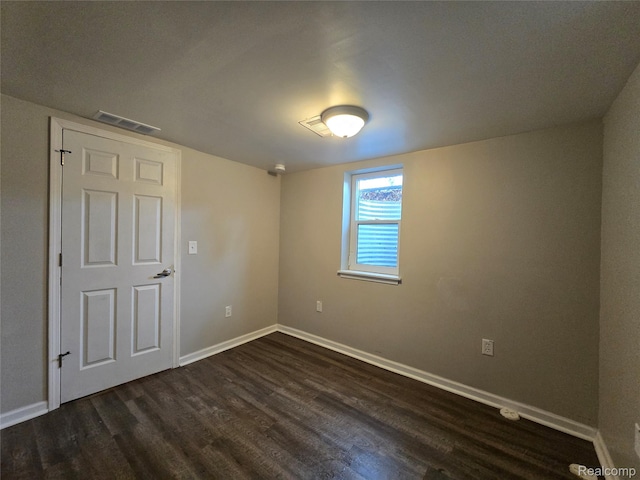 203 S Wilson Ave, Royal Oak, MI 48067 - spare room with dark wood-type flooring and baseboards
