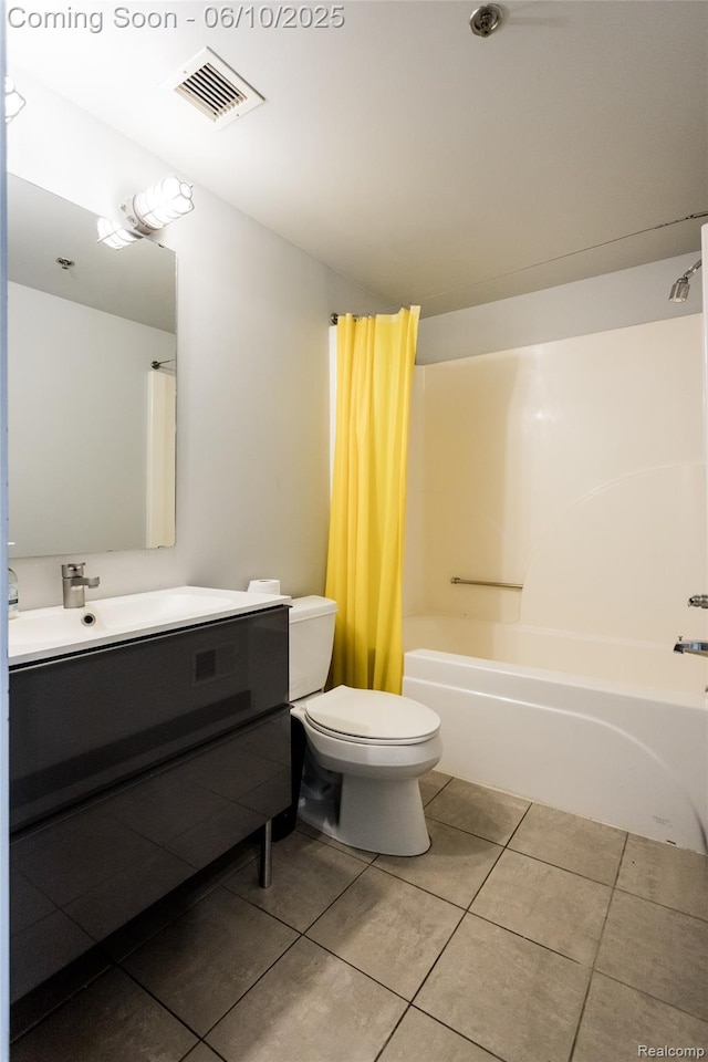 460 W Canfield Street Loft 207/ Unit 16, Detroit, MI 48201 - bathroom featuring tile patterned floors, vanity, shower / bathtub combination with curtain, and toilet