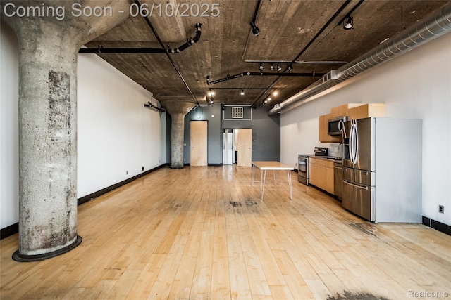 460 W Canfield Street Loft 207/ Unit 16, Detroit, MI 48201 - unfurnished living room featuring light wood-type flooring and baseboards