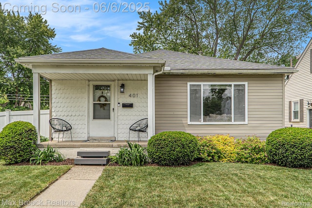 401 N Minerva Ave, Royal Oak, MI 48067 - bungalow-style house featuring covered porch and roof with shingles