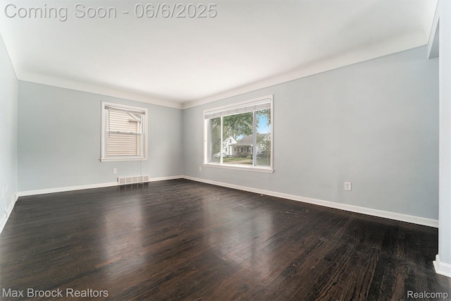 401 N Minerva Ave, Royal Oak, MI 48067 - empty room with dark wood-style flooring and baseboards