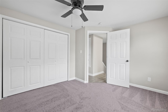 19215 Winthrop St, Dearborn, MI 48235 - unfurnished bedroom featuring carpet, a closet, baseboards, and a ceiling fan