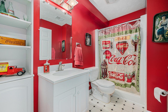 6533 Cannon Farms Dr NE, Rockford, MI 49341 - bathroom featuring vanity, a shower with shower curtain, toilet, and a textured ceiling