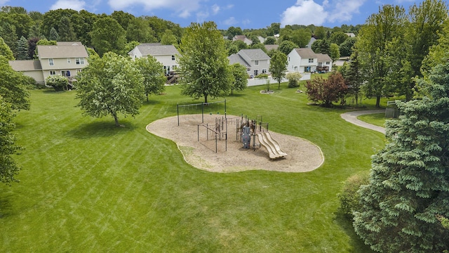 6533 Cannon Farms Dr NE, Rockford, MI 49341 - view of green lawn with a residential view