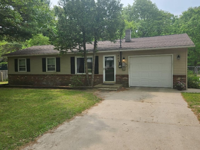 661 W Michigan Rd, Twin Lake, MI 49457 - single story home featuring brick siding, concrete driveway, and a garage