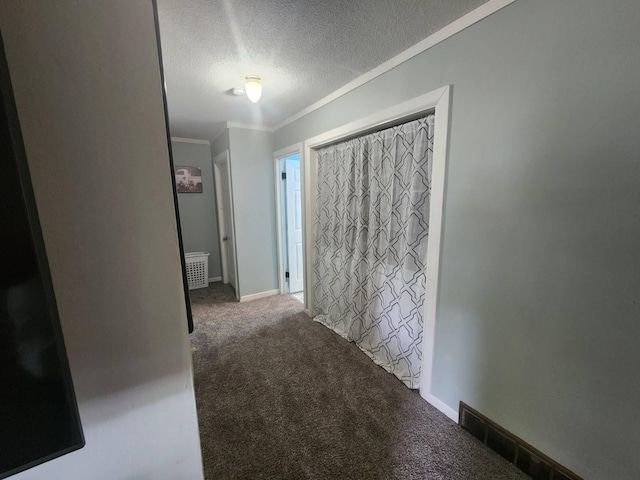 661 W Michigan Rd, Twin Lake, MI 49457 - hallway featuring carpet, a textured ceiling, ornamental molding, and baseboards
