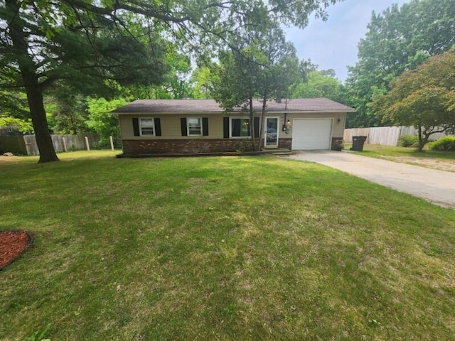 661 W Michigan Rd, Twin Lake, MI 49457 - ranch-style house with brick siding, concrete driveway, and a garage