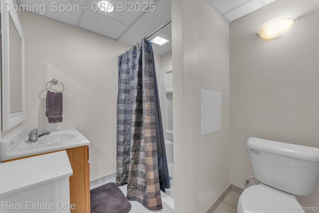 15719 Greenview, Fraser, MI 48026 - full bathroom with vanity, a shower with shower curtain, a paneled ceiling, and tile patterned floors