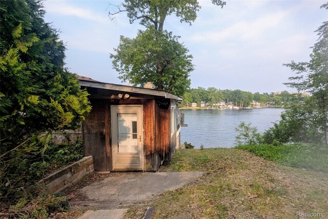 15229 Longfellow Dr, Byron, MI 48418 - view of outbuilding featuring a water view