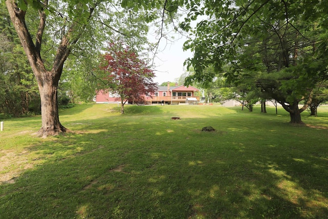 2524 N Mckinley Rd, Flushing, MI 48433 - view of grassy yard with a deck