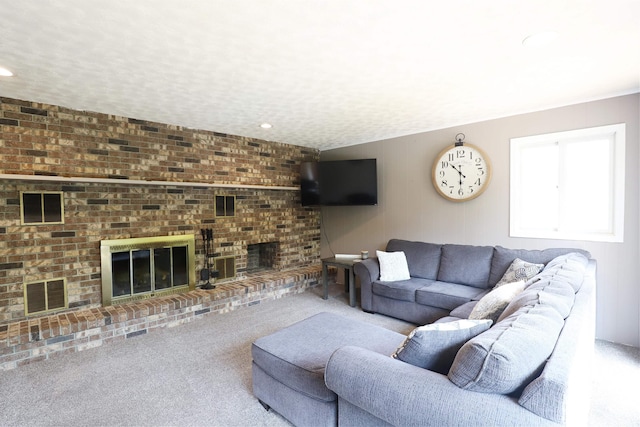 2524 N Mckinley Rd, Flushing, MI 48433 - living area with a brick fireplace, carpet flooring, and recessed lighting