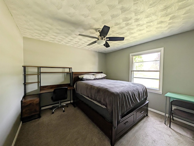 2524 N Mckinley Rd, Flushing, MI 48433 - bedroom with carpet, baseboards, an office area, a textured ceiling, and a ceiling fan