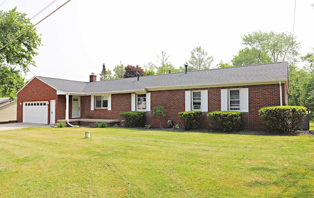 2524 N Mckinley Rd, Flushing, MI 48433 - ranch-style house featuring brick siding, a garage, a front lawn, and a chimney