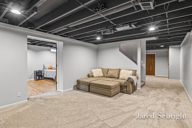 6872 Forest Valley Dr SE, Grand Rapids, MI 49546 - carpeted living area featuring baseboards