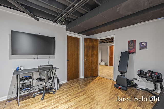 6872 Forest Valley Dr SE, Grand Rapids, MI 49546 - office area with wood finished floors and baseboards