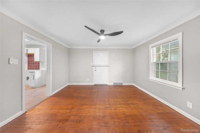 3951 Devonshire Rd, Detroit, MI 48224 - empty room featuring ceiling fan, wood finished floors, baseboards, and ornamental molding