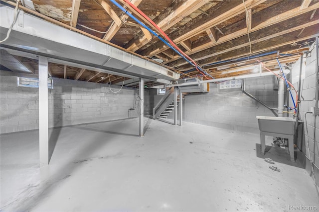 3951 Devonshire Rd, Detroit, MI 48224 - unfinished basement with stairway and a sink
