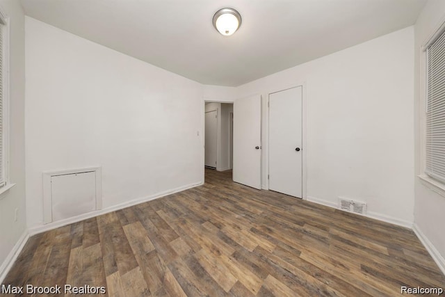 17187 Vaughan St, Detroit, MI 48219 - unfurnished bedroom with wood finished floors and baseboards